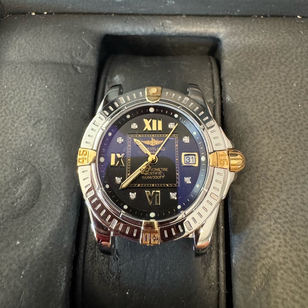Breitling Black and Gold Watch
